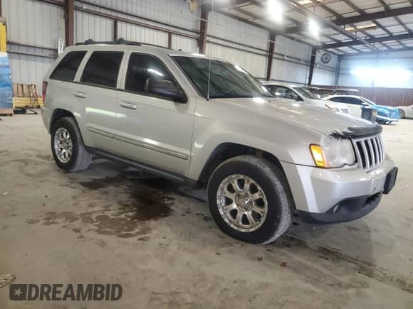 2010 Jeep Grand Cherokee Laredo с VIN 1J4PR4GKXAC127433, выставлен на аукционе Copart как лот 86221175 с пробегом 175 643 миль миль и Списание • Salvage title. История ставок и продаж доступна на DreamBid. Изображение 4.