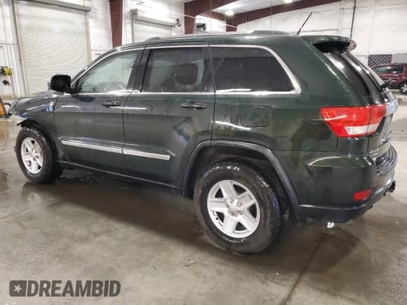 2011 Jeep Grand Cherokee 70th Anniversary z VIN 1J4RR4GT3BC736981, wystawiony jako Copart lot #49171525 z przebiegiem 127 438 mil mil oraz Szkoda całkowita • Salvage title. Historia ofert i sprzedaży dostępna na DreamBid. Obrazek 2.