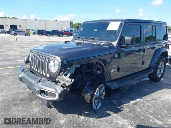 2021 Jeep Wrangler Unlimited Sahara z VIN 1C4HJXEN3MW525716, wystawiony jako IAAI lot #42974390 z przebiegiem 87 931 mil mil oraz . Historia ofert i sprzedaży dostępna na DreamBid. Obrazek 2.