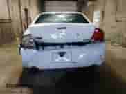 2013 Chevrolet Impala Police z VIN 2G1WD5E3XD1243509, wystawiony jako Copart lot #66715925 z przebiegiem 158 766 mil mil oraz Szkoda całkowita • Salvage title. Historia ofert i sprzedaży dostępna na DreamBid. Obrazek 6.