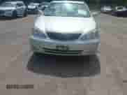 2002 Toyota Camry XLE with VIN JTDBF30K620081292, listed as a IAAI auction lot 42701432 with 146,950 mi miles and . Bid and sale history available at DreamBid. Image 6.