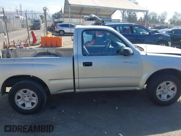 2001 Toyota Tacoma z VIN 5TENL42N21Z795860, wystawiony jako IAAI lot #43221268 z przebiegiem 279 211 mil mil oraz . Historia ofert i sprzedaży dostępna na DreamBid. Obrazek 13.