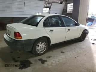 1999 Saturn SL с VIN 1G8ZH528XXZ235067, выставлен на аукционе Copart как лот 74508564 с пробегом 155 180 миль миль и Списание • Salvage title. История ставок и продаж доступна на DreamBid. Изображение 3.