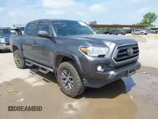 2023 Toyota Tacoma SR5 z VIN 3TMAZ5CN0PM200768, wystawiony jako IAAI lot #42439143 z przebiegiem 68 631 mil mil oraz . Historia ofert i sprzedaży dostępna na DreamBid. Obrazek 1.