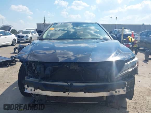 2019 Toyota Camry SE z VIN 4T1B11HK5KU709158, wystawiony jako IAAI lot #43355088 z przebiegiem 108 413 mil mil oraz . Historia ofert i sprzedaży dostępna na DreamBid. Obrazek 13.