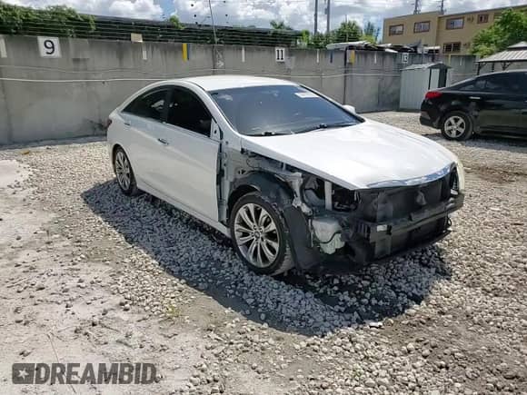 2012 Hyundai Sonata SE z VIN 5NPEC4ACXCH500316, wystawiony jako Copart lot #84879055 z przebiegiem 171 650 mil mil oraz Szkoda całkowita • Salvage title. Historia ofert i sprzedaży dostępna na DreamBid. Obrazek 14.