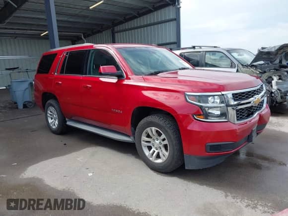 2015 Chevrolet Tahoe LT z VIN 1GNSKBKC9FR126438, wystawiony jako IAAI lot #43276273 z przebiegiem 92 503 mil mil oraz . Historia ofert i sprzedaży dostępna na DreamBid. Obrazek 1.