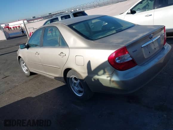 2002 Toyota Camry LE with VIN JTDBE32K120127837, listed as a IAAI auction lot 43414026 with 143,201 mi miles and . Bid and sale history available at DreamBid. Image 3.