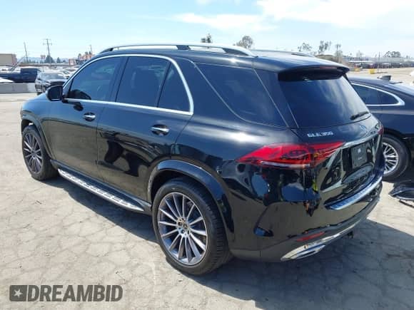 2023 Mercedes-Benz GLE 350 with VIN 4JGFB4JB1PA959788, listed as a IAAI auction lot 42013164 with 31,656 mi miles and . Bid and sale history available at DreamBid. Image 3.