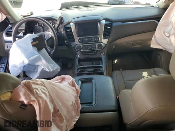 2015 Chevrolet Tahoe LTZ с VIN 1GNSKCKC0FR139651, выставлен на аукционе Copart как лот 81580235 с пробегом Не указан миль и Списание • Salvage title. История ставок и продаж доступна на DreamBid. Изображение 8.