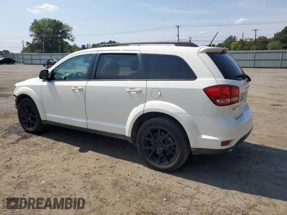 2016 Dodge Journey SXT with VIN 3C4PDDBG7GT216610, listed as a Copart auction lot 69681695 with 97,874 mi miles and Salvage title. Bid and sale history available at DreamBid. Image 2.