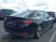 2024 BMW i4 xDrive40 with VIN WBY83FB03RFT31075, listed as a IAAI auction lot 42743691 with 14,883 mi miles and . Bid and sale history available at DreamBid. Image 4.