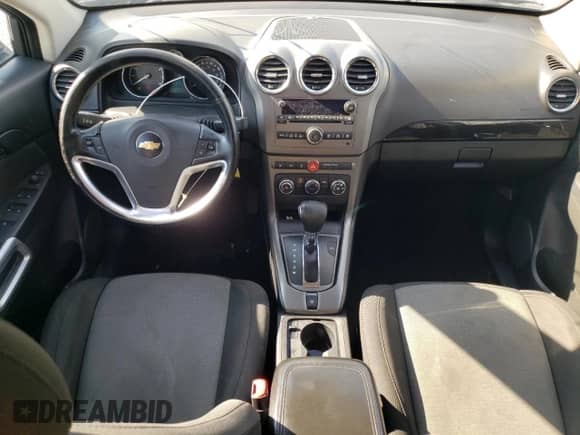 2014 Chevrolet Captiva Sport LT с VIN 3GNAL3EK8ES566227, выставлен на аукционе Copart как лот 71178734 с пробегом 196 064 миль миль и Списание • Salvage title. История ставок и продаж доступна на DreamBid. Изображение 8.