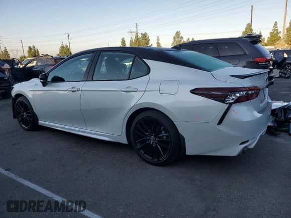 2023 Toyota Camry Hybrid XSE с VIN 4T1K31AK5PU050459, выставлен на аукционе Copart как лот 81764945 с пробегом 42 571 миль миль и Списание • Salvage title. История ставок и продаж доступна на DreamBid. Изображение 2.