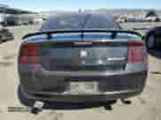 2010 Dodge Charger SXT z VIN 2B3CA3CV9AH210274, wystawiony jako Copart lot #74743934 z przebiegiem 182 675 mil mil oraz Szkoda całkowita • Salvage title. Historia ofert i sprzedaży dostępna na DreamBid. Obrazek 6.