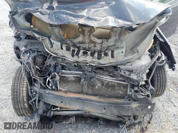 2012 Toyota Prius Four z VIN JTDKDTB34C1512557, wystawiony jako Copart lot #81591185 z przebiegiem Nie podano mil oraz Szkoda całkowita • Salvage title. Historia ofert i sprzedaży dostępna na DreamBid. Obrazek 11.