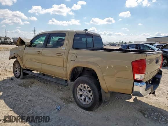 2017 Toyota Tacoma SR5 z VIN 5TFCZ5AN6HX090087, wystawiony jako Copart lot #85678565 z przebiegiem 179 577 mil mil oraz Szkoda całkowita • Salvage title. Historia ofert i sprzedaży dostępna na DreamBid. Obrazek 2.