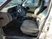 1993 Jeep Grand Cherokee Laredo with VIN 1J4GZ58Y0PC584429, listed as a Copart auction lot 58251785 with 147,913 mi miles and Salvage title. Bid and sale history available at DreamBid. Image 7.