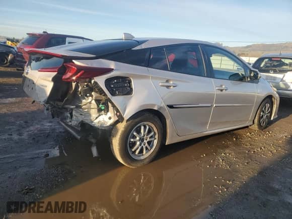 2022 Toyota Prius Limited with VIN JTDKAMFPXN3210371, listed as a Copart auction lot 87244264 with 55,591 mi miles and Salvage title. Bid and sale history available at DreamBid. Image 3.