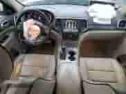 2018 Jeep Grand Cherokee Overland with VIN 1C4RJFCT7JC435403, listed as a Copart auction lot 86568024 with 105,681 mi miles and Salvage title. Bid and sale history available at DreamBid. Image 8.