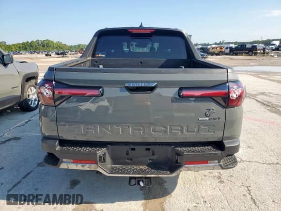 2024 Hyundai Santa Cruz Limited с VIN 5NTJEDDF1RH120452, выставлен на аукционе Copart как лот 71207545 с пробегом 8 261 миль миль и Списание • Salvage title. История ставок и продаж доступна на DreamBid. Изображение 6.