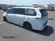 2015 Toyota Sienna SE with VIN 5TDXK3DC2FS621891, listed as a IAAI auction lot 42832318 with 110,420 mi miles and . Bid and sale history available at DreamBid. Image 3.