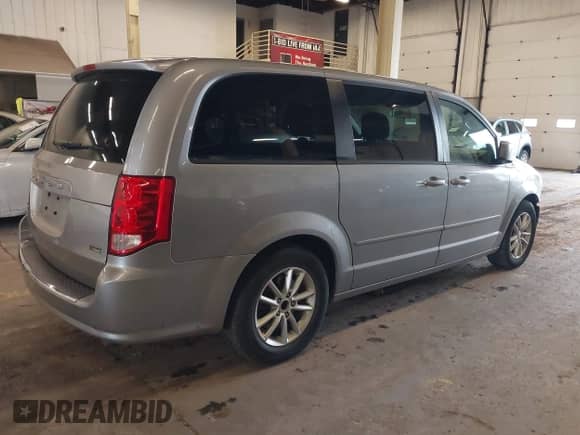 2013 Dodge Grand Caravan SXT with VIN 2C4RDGCG8DR687639, listed as a IAAI auction lot 41277348 with 126,128 mi miles and . Bid and sale history available at DreamBid. Image 4.