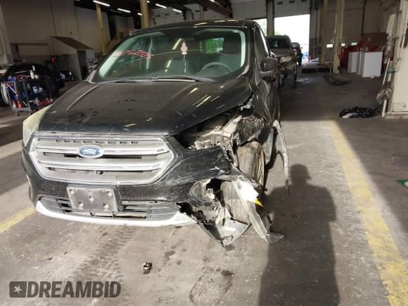 2017 Ford Escape SE z VIN 1FMCU9G93HUA51521, wystawiony jako IAAI lot #43052205 z przebiegiem 93 947 mil mil oraz . Historia ofert i sprzedaży dostępna na DreamBid. Obrazek 6.