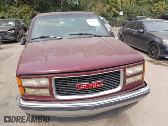 1996 GMC Sierra 1500 with VIN 1GTEC14R3TE521264, listed as a IAAI auction lot 43445138 with 104,184 mi miles and . Bid and sale history available at DreamBid. Image 6.