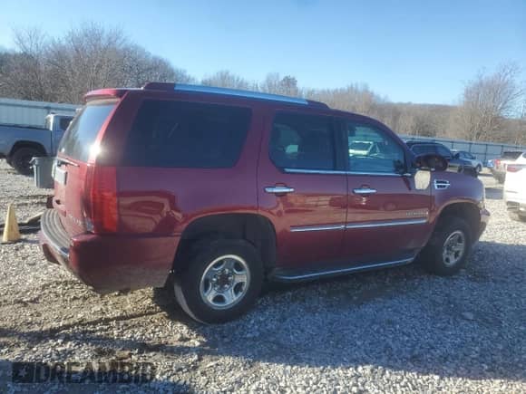 2009 Cadillac Escalade with VIN 1GYFK23229R211846, listed as a Copart auction lot 57988185 with 150,758 mi miles and Salvage title. Bid and sale history available at DreamBid. Image 3.