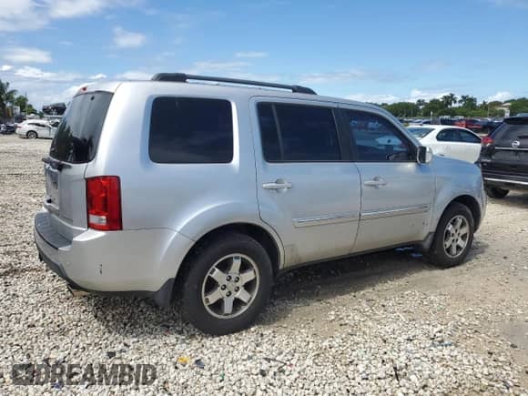 2011 Honda Pilot Touring с VIN 5FNYF3H90BB001207, выставлен на аукционе Copart как лот 81880385 с пробегом 189 683 миль миль и Чистый • Clean title. История ставок и продаж доступна на DreamBid. Изображение 3.