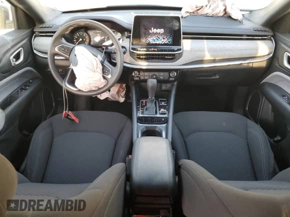 2025 Jeep Compass Sport z VIN 3C4NJDAN9ST516030, wystawiony jako Copart lot #52292005 z przebiegiem 2 094 mil mil oraz Szkoda całkowita • Salvage title. Historia ofert i sprzedaży dostępna na DreamBid. Obrazek 8.