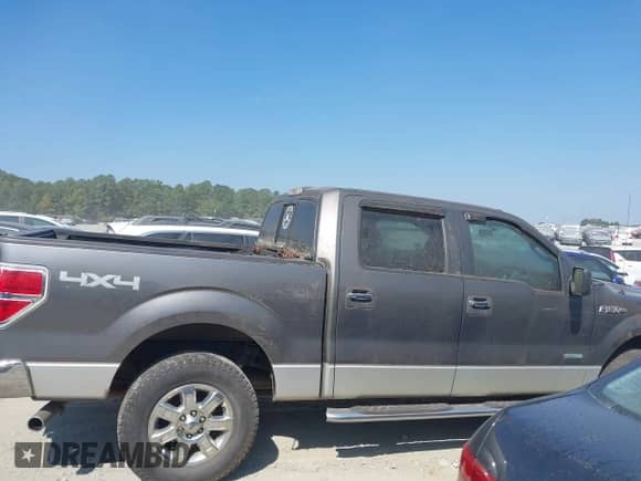 2013 Ford F-150 Lariat with VIN 1FTFW1ET5DFC93463, listed as a IAAI auction lot 43182949 with 133,397 mi miles and . Bid and sale history available at DreamBid. Image 13.