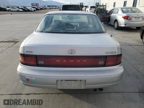 1992 Toyota Camry с VIN JT2VK13E7N0096822, выставлен на аукционе Copart как лот 71635274 с пробегом 172 511 миль миль и Списание • Salvage title. История ставок и продаж доступна на DreamBid. Изображение 6.
