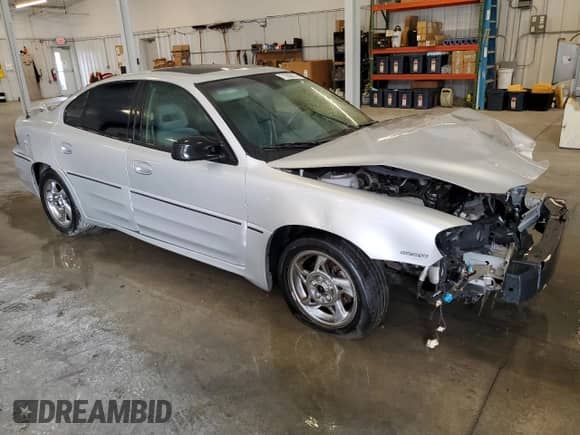 2002 Pontiac Grand Am GT с VIN 1G2NW52E32M656168, выставлен на аукционе Copart как лот 71008015 с пробегом Не указан миль и Списание • Salvage title. История ставок и продаж доступна на DreamBid. Изображение 4.