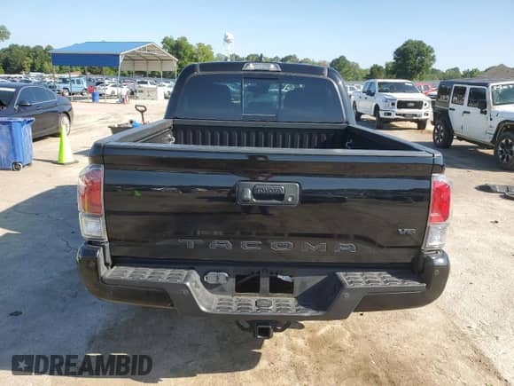 2023 Toyota Tacoma SR with VIN 3TYCZ5AN8PT160505, listed as a Copart auction lot 64601695 with 35,234 mi miles and Salvage title. Bid and sale history available at DreamBid. Image 6.
