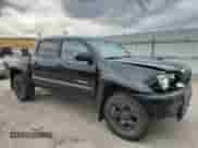 2014 Toyota Tacoma with VIN 3TMLU4EN7EM153086, listed as a Copart auction lot 82047665 with 146,272 mi miles and Salvage title. Bid and sale history available at DreamBid. Image 4.