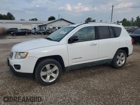2011 Jeep Compass с VIN 1J4NT1FA5BD290521, выставлен на аукционе Copart как лот 68497485 с пробегом 124 082 миль миль и Списание • Salvage title. История ставок и продаж доступна на DreamBid. Изображение 1.