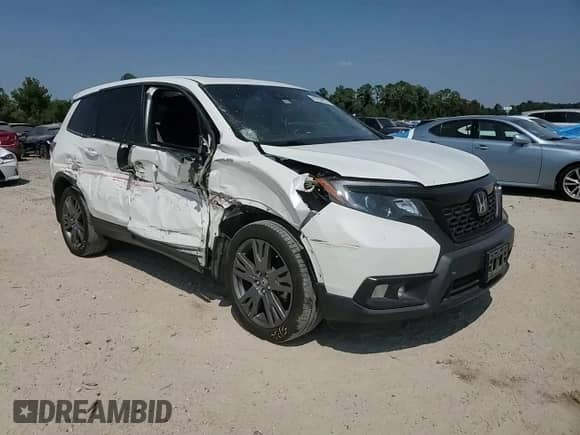 2021 Honda Passport EX-L с VIN 5FNYF7H55MB004689, выставлен на аукционе Copart как лот 80755855 с пробегом 97 016 миль миль и Списание • Salvage title. История ставок и продаж доступна на DreamBid. Изображение 14.