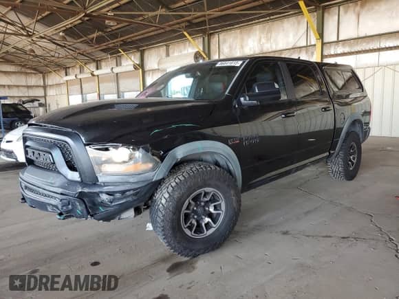 2017 Ram 1500 Rebel z VIN 1C6RR7YT5HS508234, wystawiony jako Copart lot #86841615 z przebiegiem 122 967 mil mil oraz Szkoda całkowita • Salvage title. Historia ofert i sprzedaży dostępna na DreamBid. Obrazek 1.