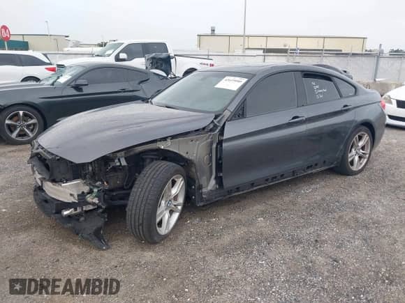 2017 BMW 4 Series 430i with VIN WBA4F7C57HG786475, listed as a IAAI auction lot 42619080 with 88,784 mi miles and . Bid and sale history available at DreamBid. Image 2.