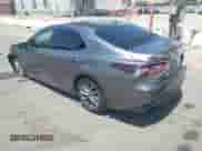 2023 Toyota Camry LE z VIN 4T1C11AK8PU106694, wystawiony jako IAAI lot #42902448 z przebiegiem 100 034 mil mil oraz . Historia ofert i sprzedaży dostępna na DreamBid. Obrazek 3.