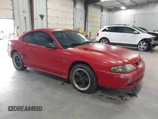 1996 Ford Mustang GT z VIN 1FALP42X1TF189629, wystawiony jako IAAI lot #43225794 z przebiegiem 194 157 mil mil oraz . Historia ofert i sprzedaży dostępna na DreamBid. Obrazek 1.