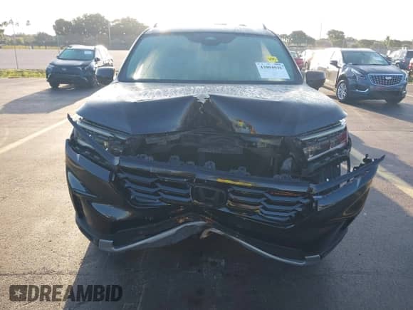 2025 Honda Pilot TrailSport with VIN 5FNYG1H6XSB006275, listed as a IAAI auction lot 43004046 with 55,380 mi miles and . Bid and sale history available at DreamBid. Image 12.