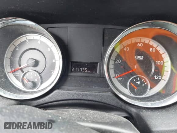 2014 Dodge Grand Caravan SE with VIN 2C4RDGBG7ER361821, listed as a IAAI auction lot 42919043 with 211,735 mi miles and . Bid and sale history available at DreamBid. Image 7.