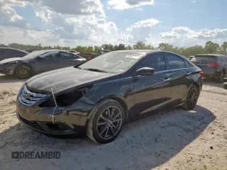 2012 Hyundai Sonata SE с VIN 5NPEC4AB6CH431289, выставлен на аукционе Copart как лот 85367955 с пробегом 172 294 миль миль и Списание • Salvage title. История ставок и продаж доступна на DreamBid. Изображение 1.