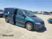 2000 Dodge Caravan SE with VIN 1B4GP44G2YB763370, listed as a Copart auction lot 64146365 with 162,852 mi miles and Salvage title. Bid and sale history available at DreamBid. Image 4.