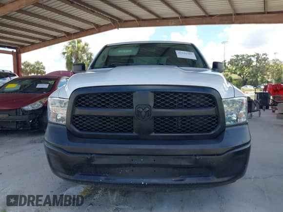 2013 Ram 1500 Tradesman z VIN 1C6RR6FP0DS509897, wystawiony jako IAAI lot #42531385 z przebiegiem 298 076 mil mil oraz . Historia ofert i sprzedaży dostępna na DreamBid. Obrazek 12.
