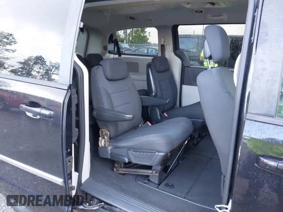 2010 Dodge Grand Caravan SXT with VIN 2D4RN5D19AR409651, listed as a IAAI auction lot 43335959 with 179,715 mi miles and . Bid and sale history available at DreamBid. Image 8.