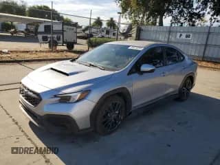 2022 Subaru WRX with VIN JF1VBAA69N9011628, listed as a Copart auction lot 65618295 with 53,740 mi miles and Salvage title. Bid and sale history available at DreamBid. Image 1.